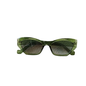 Vintage oval green transparent sunglasses for men and women with retro cat-eye frame