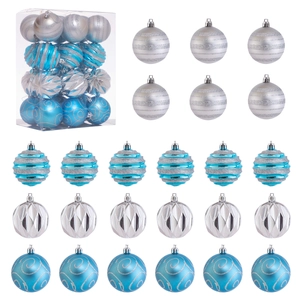 Detailed view of blue and silver assorted 6cm Christmas balls with glitter patterns