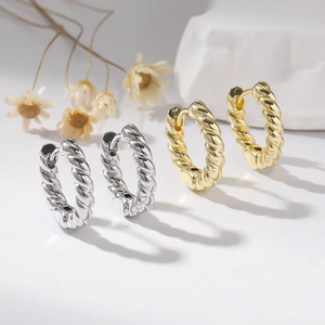 Chic twisted rope hoop earrings available in polished gold and silver finishes