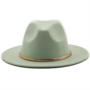 Close-up of mint green wool fedora hat with a delicate gold metal decorative band
