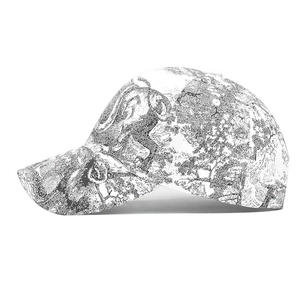 Close-up of vintage black tiger pattern printed on white cotton canvas baseball cap