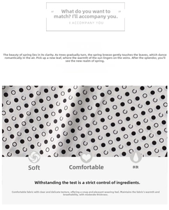 Detail of soft black and white polka dot silk-like fabric with breathable texture