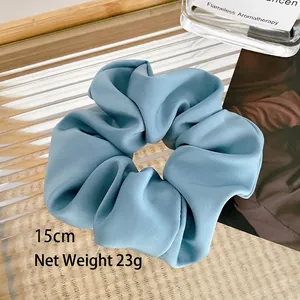Morandi blue oversized satin scrunchie 15cm large hair tie on glass tray for women
