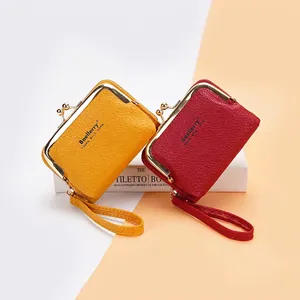 Retro Baellerry zip coin purse in yellow and red leather with metal frame and wrist strap