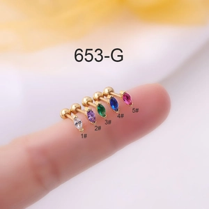 Macro view of five colorful marquise zircon studs on fingertips with model 653-G numbers