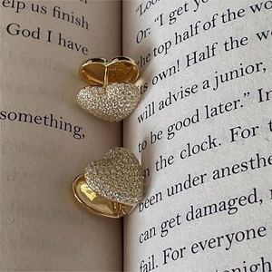 Elegant 925 silver heart stud earrings with sparkling pave zircon on vintage book pages