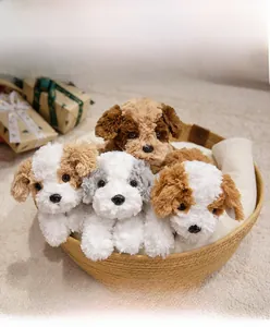 Detail of plush puppies with weighted beads inside a woven basket gift box
