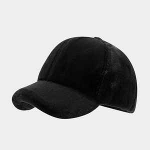 Close-up of plush black baseball cap showing soft faux fur texture and six-panel design