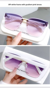 Detail of rimless gradient purple lenses and beige temples with geometric texture