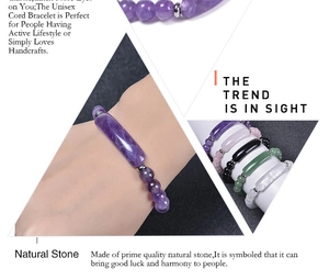 Detail shot of assorted natural stone bracelets including amethyst and rose quartz