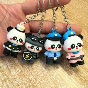 Cute panda silicone keychain set featuring four professional uniforms in a group display