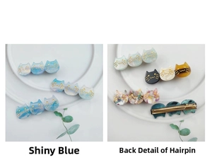 Detailed macro view of cute triple cat acetate hair clips with marble texture and metal clip