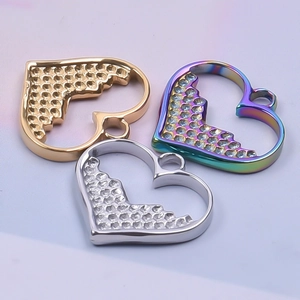 Three minimalist stainless steel heart-shaped hollow charms in gold, silver and rainbow colors