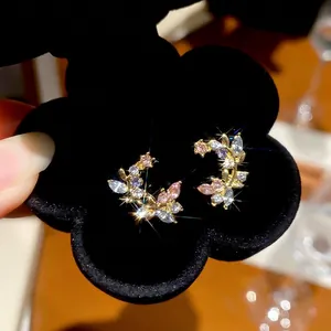 Sparkling crystal branch earrings with pink and purple zircon stones in a floral box