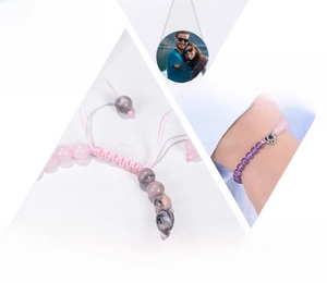 Detail of pink and purple tiger eye stone bracelet with custom heart photo projection pendant