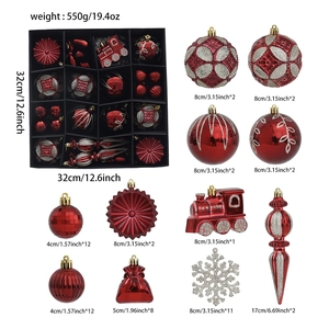 Detailed view of red and silver Christmas tree ornaments set including stars and snowflakes
