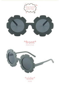 Flower-shaped kids sunglasses in grey, showing front and side views on white background