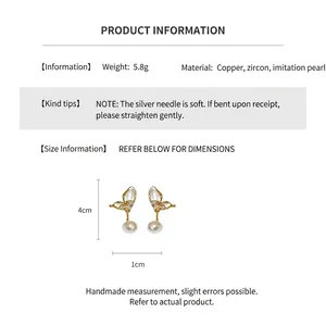 Detail showing butterfly earrings with pearl pendant, copper and zircon specs, 4cm height