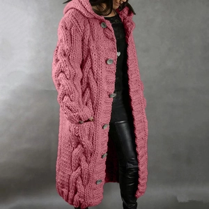 Detailed knit texture of long cable knit hooded cardigan with gray buttons in dusty rose