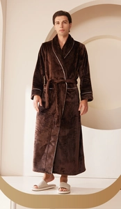 Detail of dark brown flannel robe featuring white piping trim and plush velvet texture