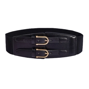 Women's vintage black elastic wide waist belt with double gold buckles on white background