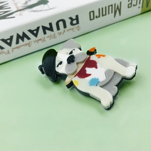 Cute cartoon puppy artist acrylic brooch with black beret and colorful scarf on books