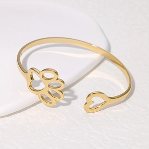 Bracciale rigido dorato in acciaio inossidabile con cuore e zampa di animale