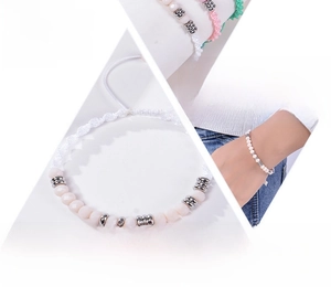 Detail view of Morse code beaded bracelet with adjustable cord and message card