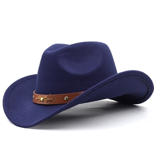 Close-up of a dark blue wool cowboy hat with a brown leather band and metal studs