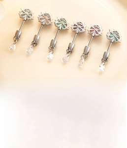 Detailed view of colorful heart-shaped cubic zirconia stud earrings in titanium steel