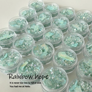 Sparkling mint green crystal stone and shell nail art charms set in clear jars