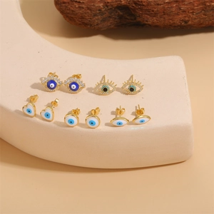 Set of 6 gold plated evil eye stud earrings with blue enamel and sparkling zircon accents