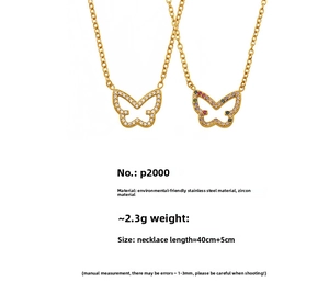 Detail of butterfly necklaces with colorful zircon stones on gold stainless steel chain