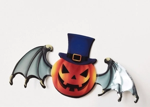 Detail of 3D Halloween wall sticker featuring pumpkin with blue hat and bat wings