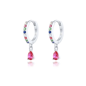 Detail of S925 silver hoop earrings with multicolored stones and red teardrop pendant