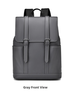 Front view of grey minimalist business backpack with buckle straps and side pockets