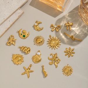 18K gold plated stainless steel marine charms collection with starfish and octopus designs