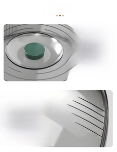 Detail of transparent food cover showing green round handle and anti-slip ribbed texture