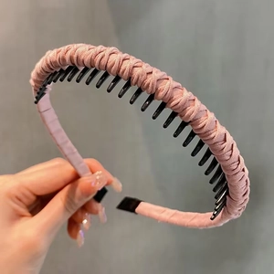 Pink braided headband with non-slip inner teeth for high cranial top hair styling