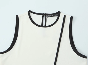 Close-up of the elegant neckline and contrast trim on this crepe sleeveless top