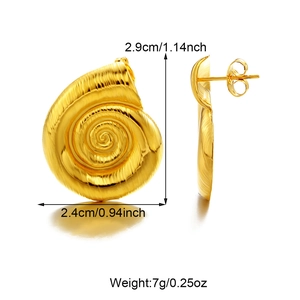Detailed view of conch shell shaped gold earrings with metal texture and size dimensions