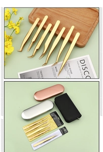 Macro detail of seven professional golden stainless steel eyelash tweezers with storage cases
