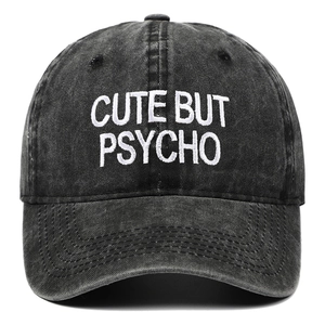 Washed black baseball cap with Cute But Psycho embroidery for a trendy street look