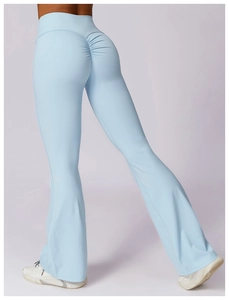 Detail of scrunch butt seam on high waisted light blue flared yoga pants for women