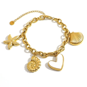 18K gold plated stainless steel bracelet with starfish, seashell, and heart charms