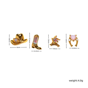 Detail view of western cowboy earrings set with gold sheriff star and boots with zircons