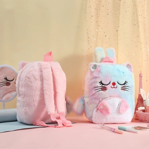 Detail of plush cat backpacks showing rainbow fur texture and pink adjustable straps
