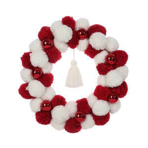 Festive Christmas wreath with red and white pom-poms and glossy ornaments on white background