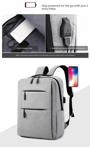 Detail view of business laptop backpack featuring external USB charging port and gray fabric