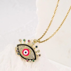 Gold evil eye pendant necklace with colorful zircons and black enamel on white rock